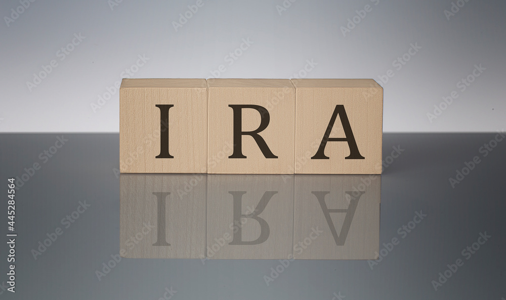 IRA concept, wooden word block on the grey background IRA concept, wooden word block on the grey background