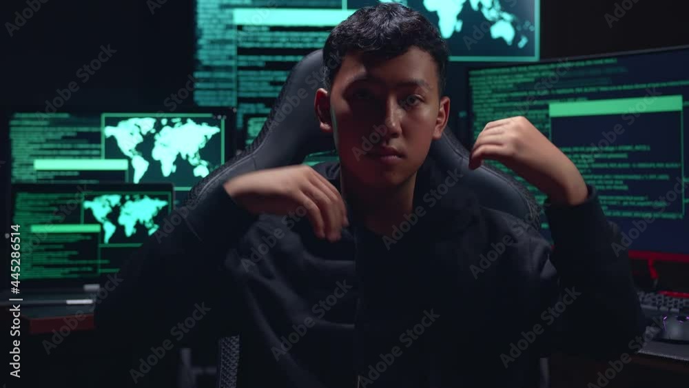 Asian Boy Hacker Takes Off His Hood And Pose With Multiple Computer Screens
Asian Boy Hacker Takes Off His Hood And Pose With Multiple Computer Screens