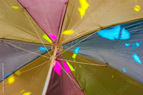 colorful parasol with sun rays
