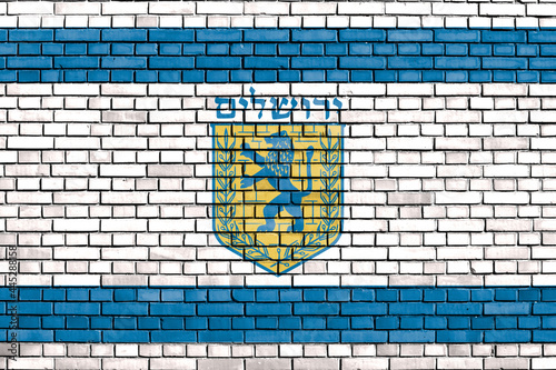 flag of Jerusalem, Israel painted on brick wall photo