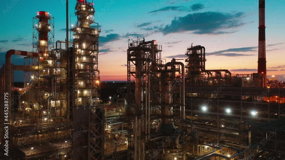 Petroleum refinery plant filmed at sunset Petroleum refinery plant filmed at sunset