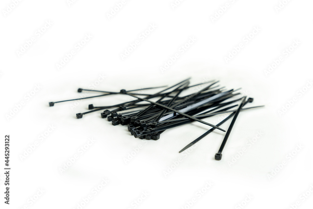 Black cable tie on isolate white background. Black cable tie on isolate white background.