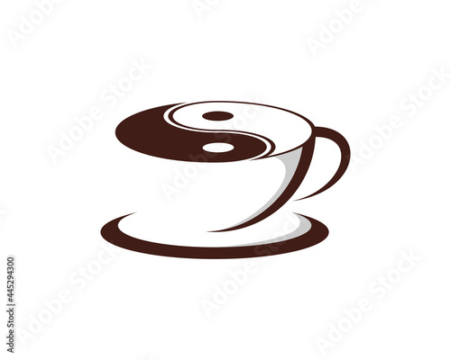 Coffee cup with yin and yang on top