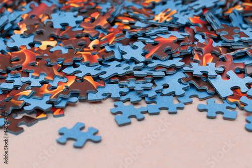 Mixed Peaces of a Colorful Jigsaw Puzzle - Strategy and Solving Problem Concept © InfinitumProdux
