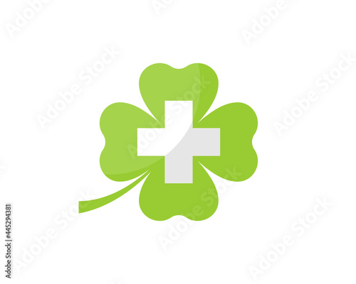 Plus medical symbol inside the clover leaf