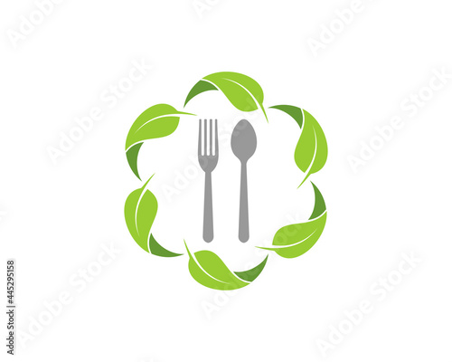 Circular nature leaves with fork and spoon inside