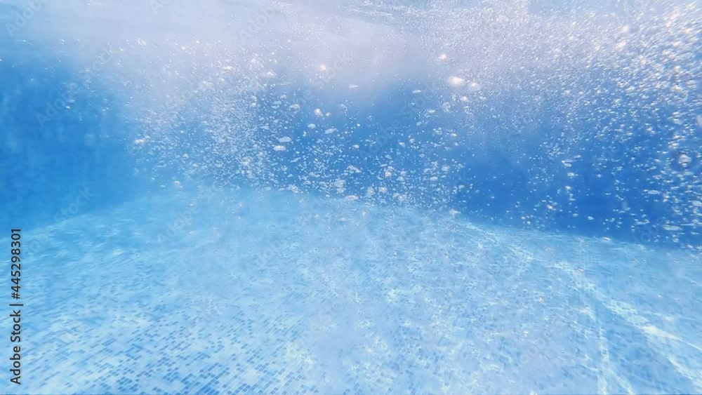 Raising underwater bubbles in thermal swimming pool, slow motion Raising underwater bubbles in thermal swimming pool, slow motion