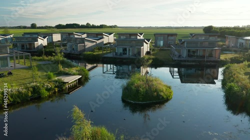 Famous Holiday Resort Of Roompot Water Village Under Cloudy Blue Sky In Kamperland Town, Netherlands. aerial photo