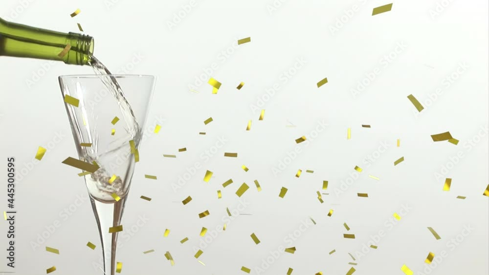 Animation of confetti falling over champagne glass on white background Animation of confetti falling over champagne glass on white background