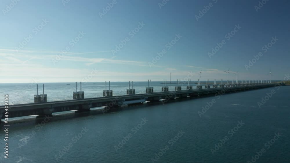Flood Gates Of Eastern Scheldt Storm Surge Barrier At The Dutch Town Of Kamperland. aerial Flood Gates Of Eastern Scheldt Storm Surge Barrier At The Dutch Town Of Kamperland. aerial