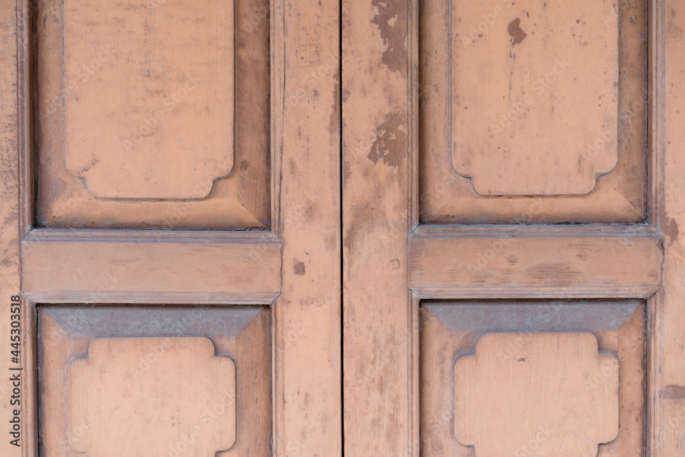 Classic backdrop wood wall and door in front of Thailand vintage traditional Building.