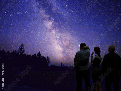 3d Computer rendered illustration of people gazing at the milky way