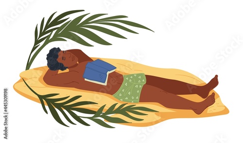 Man lying on beach, tired napping male with book