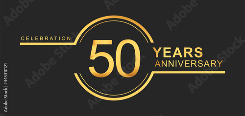 50th years anniversary golden and silver color with circle ring isolated on black background for anniversary celebration event photo