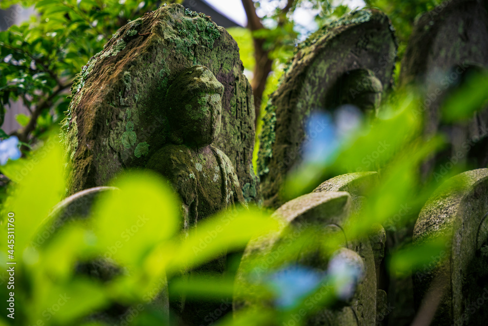 Old mossy Jizo statues.