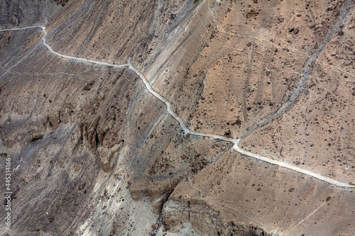 old silk rout in hunza, aerial view of a road in mountains, landscape photography of baltoro reign in Karakorum range , gilgit Baltistan ,Pakistan  photo