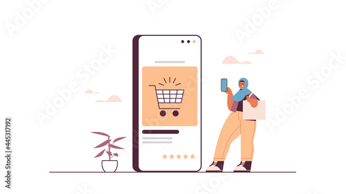 arab woman using smartphone buying things in online store sale consumerism online shopping ecommerce