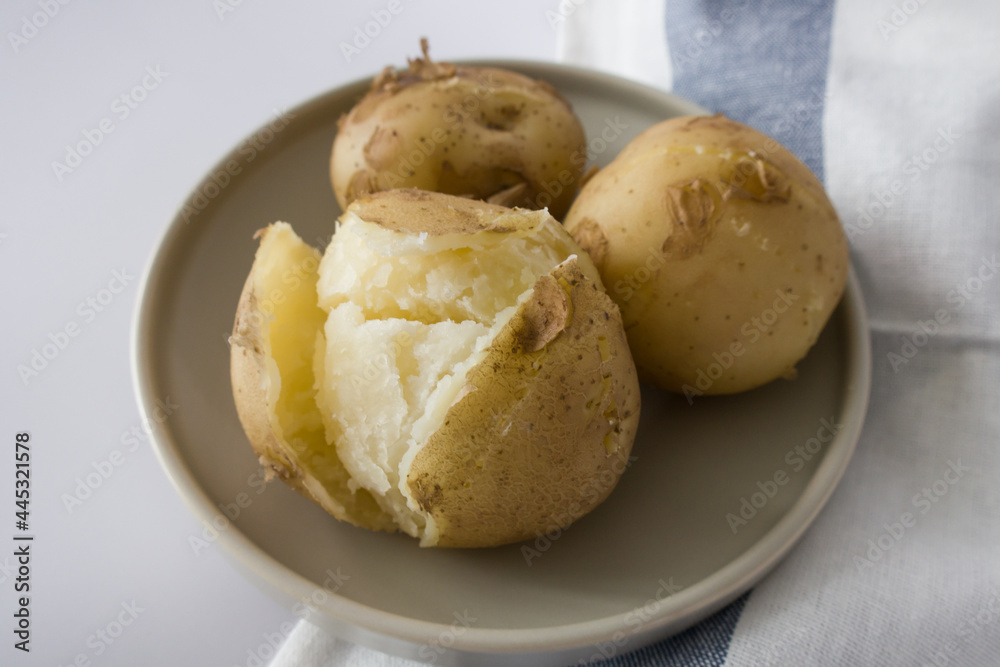 Hot boiled potatoes, base of many national cuisines. Hot boiled potatoes, base of many national cuisines.
