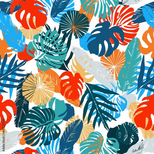 Bright tropical leaves on a white background. Colorful vector seamless pattern.