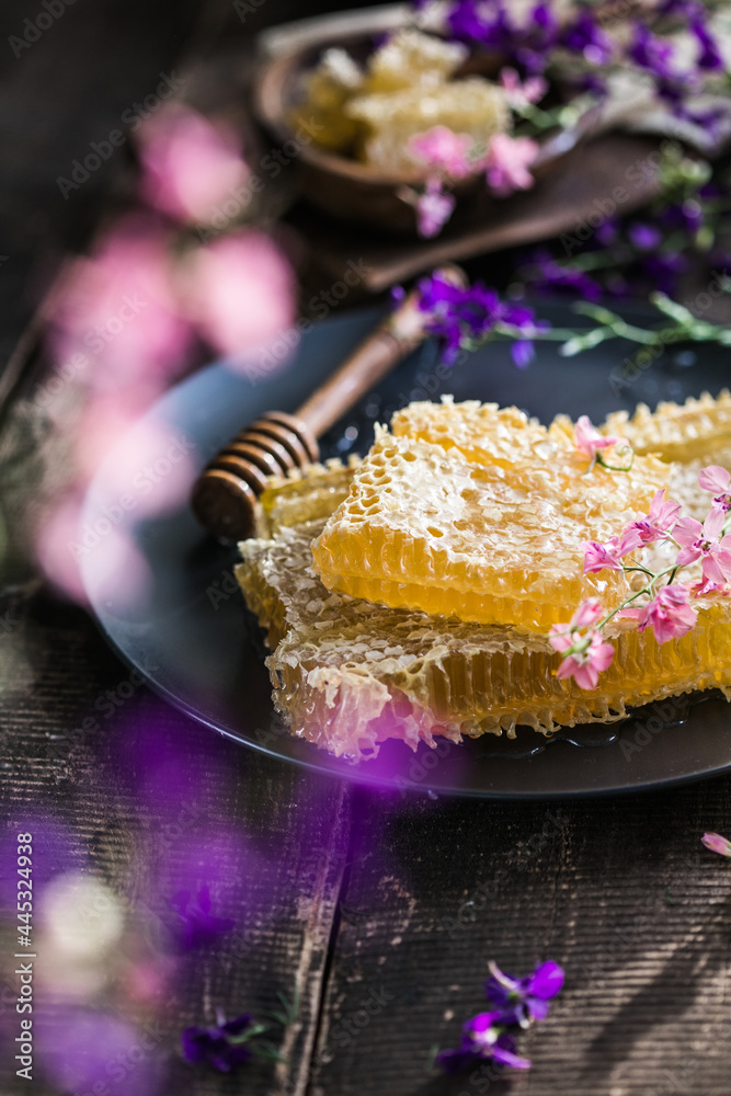 honeycombs with full cells of honey sealed with wax on wooden table on background honeycombs honeycombs with full cells of honey sealed with wax on wooden table on background honeycombs