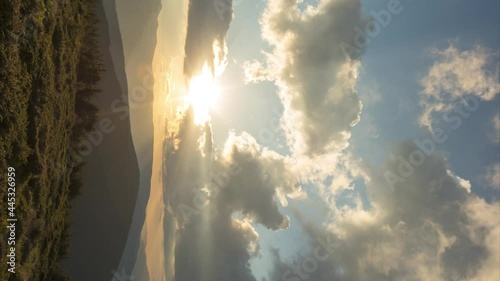 Beautiful colorful sunset in the carpathian mountains in summer. Vertical video