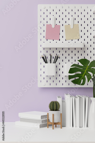 Cropped shot of lively work space and copy space for product display in purple wallpaper with room decorations © bongkarn