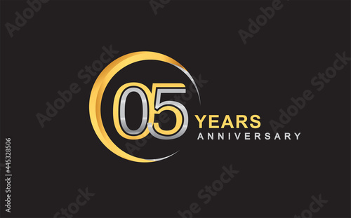 5th years anniversary golden and silver color with circle ring isolated on black background for anniversary celebration event
