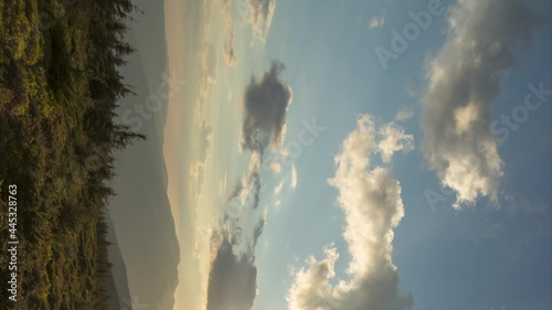 Beautiful colorful sunset in the carpathian mountains in summer. Vertical video