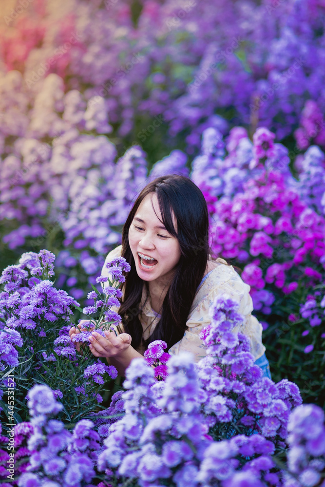 Teenager in a beautiful Margaret flower field,