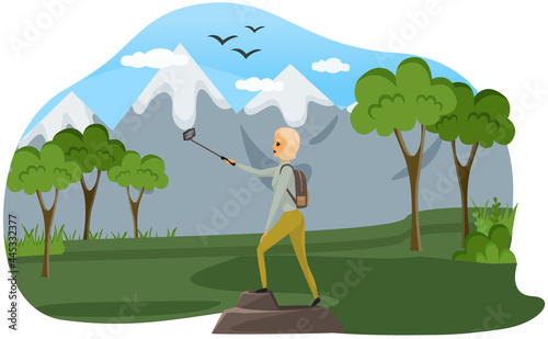 Climber reached summit of mountain. Traveling and technology concept. Lady with smartphone posing for photo on background of mountain landscape. Woman taking selfie outdoor. Girl traveling in nature