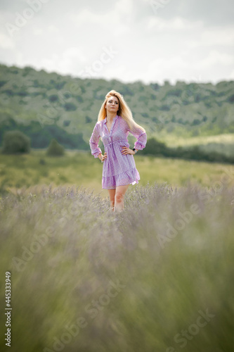 Portrait of smiling blonde woman on the lavender field