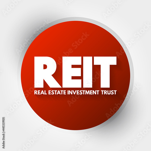 REIT - Real Estate Investment Trust acronym, business concept background