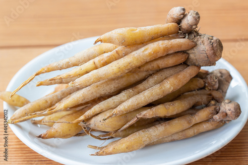 Finger root, Kaempferia Herbs healthy on white plate.