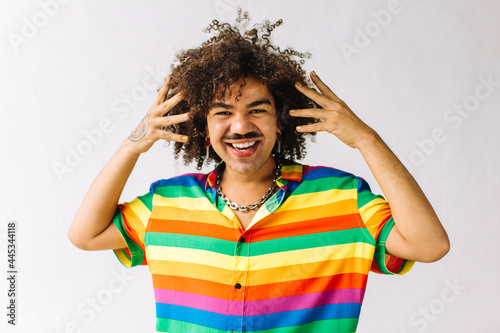 Smiling gay man embracing his identity photo