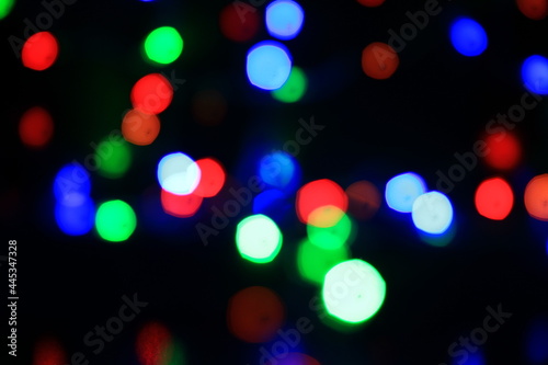 Abstract multi colored lights on a black background.