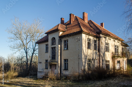 Large, abandoned house in the Rudbarzi village, Latvia.
