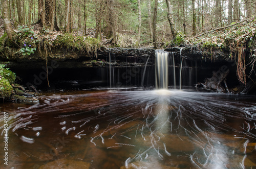 Long exposure waterfall on small river Olupite in Renda, Latvia. photo