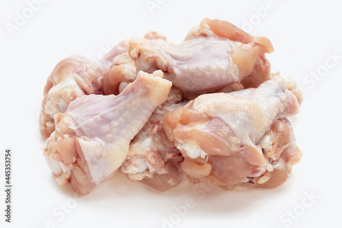 Fresh raw chicken wings (wingstick) in white background.