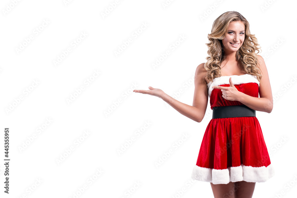 Young beautiful Santa girl in Short festive dress fur, Long blonde hair, Bright make up, Conceptual fashion art. 