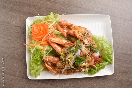 grilled bbq big tiger prawn seafood with Thai spicy chilli sauce on wood background asian halal menu