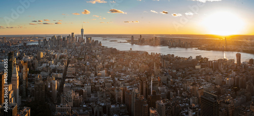 New York City skyline with urban skyscrapers at sunset, USA.