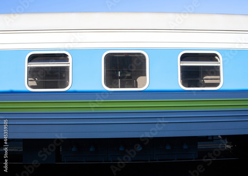 Train at the train station. Railway carriage. Windows in passenger coach.