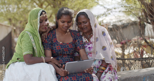 Indian family having a video call with a relative