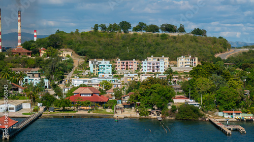 Photography Colorful buildings and villas on the coast line of Santiago de Cuba, Cuba