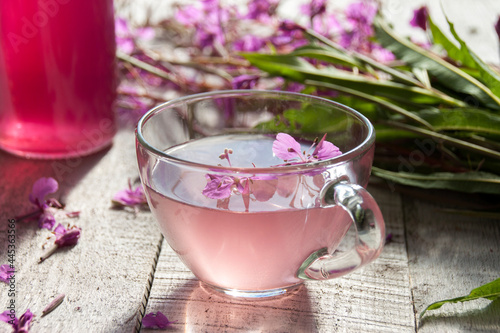 Obraz na płótnie Drink of syrup fireweed flower in glass cup