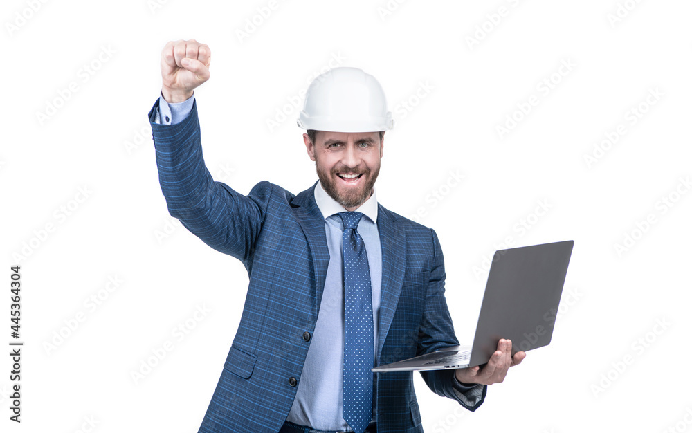 businessman in helmet with laptop. architect planning work. chief engineer in hardhat use computer businessman in helmet with laptop. architect planning work. chief engineer in hardhat use computer