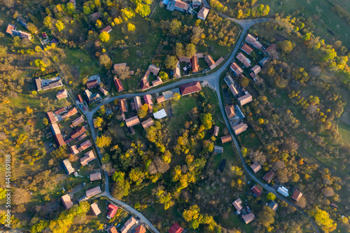 Aerial drone point of view of village streets in the autumn photo