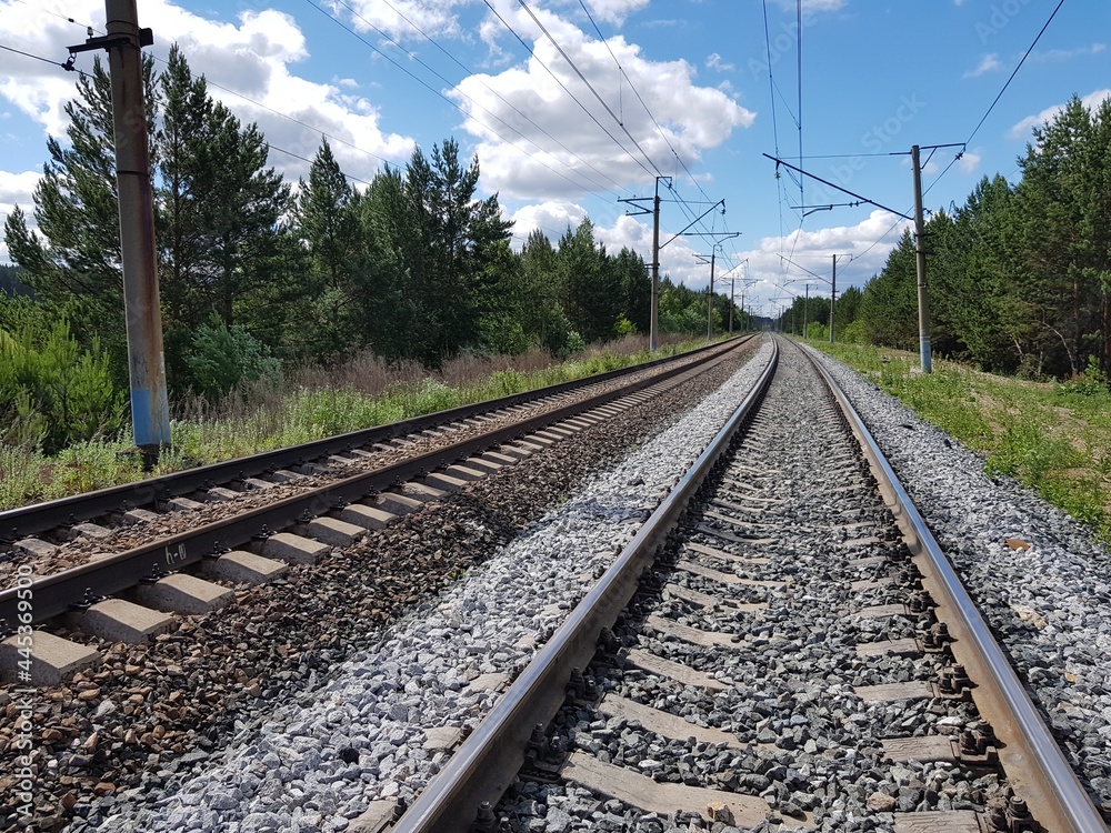 Railroad tracks reach the horizon
