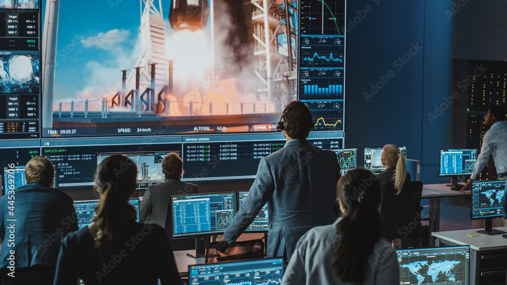 Group of People in Mission Control Center Witness Successful Space Rocket  Launch. Flight Control Employees Sit in Front Computer Displays and Monitor  the Crewed Mission. Excited and Tension Moment. Stock-Foto | Adobe