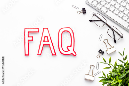 Business concept faq frequently asked questions with keyboard